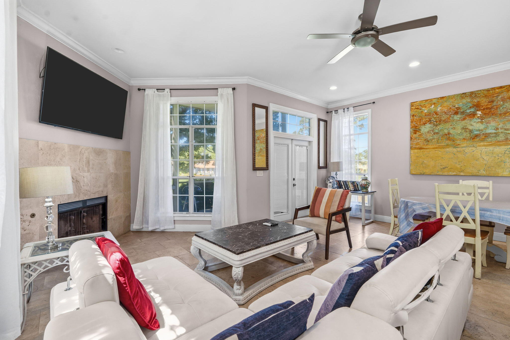 65 Vantage Point Miramar Beach, FL 32550 - Photo 19 of 63 a living room with furniture a flat screen tv and a fireplace