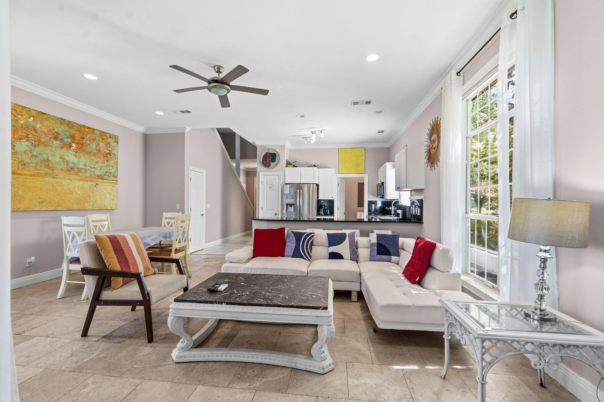 65 Vantage Point Miramar Beach, FL 32550 - Photo 20 of 63 a living room with patio furniture and a large window