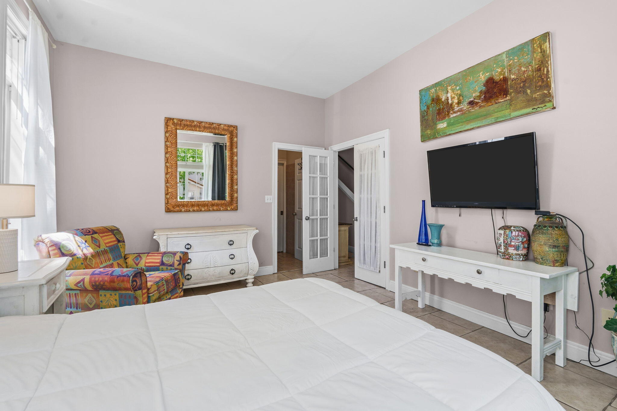 65 Vantage Point Miramar Beach, FL 32550 - Photo 23 of 63 a bedroom with a bed and flat screen tv