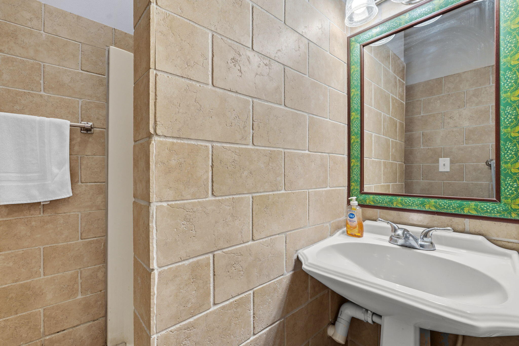 65 Vantage Point Miramar Beach, FL 32550 - Photo 26 of 63 a bathroom with a sink and a mirror