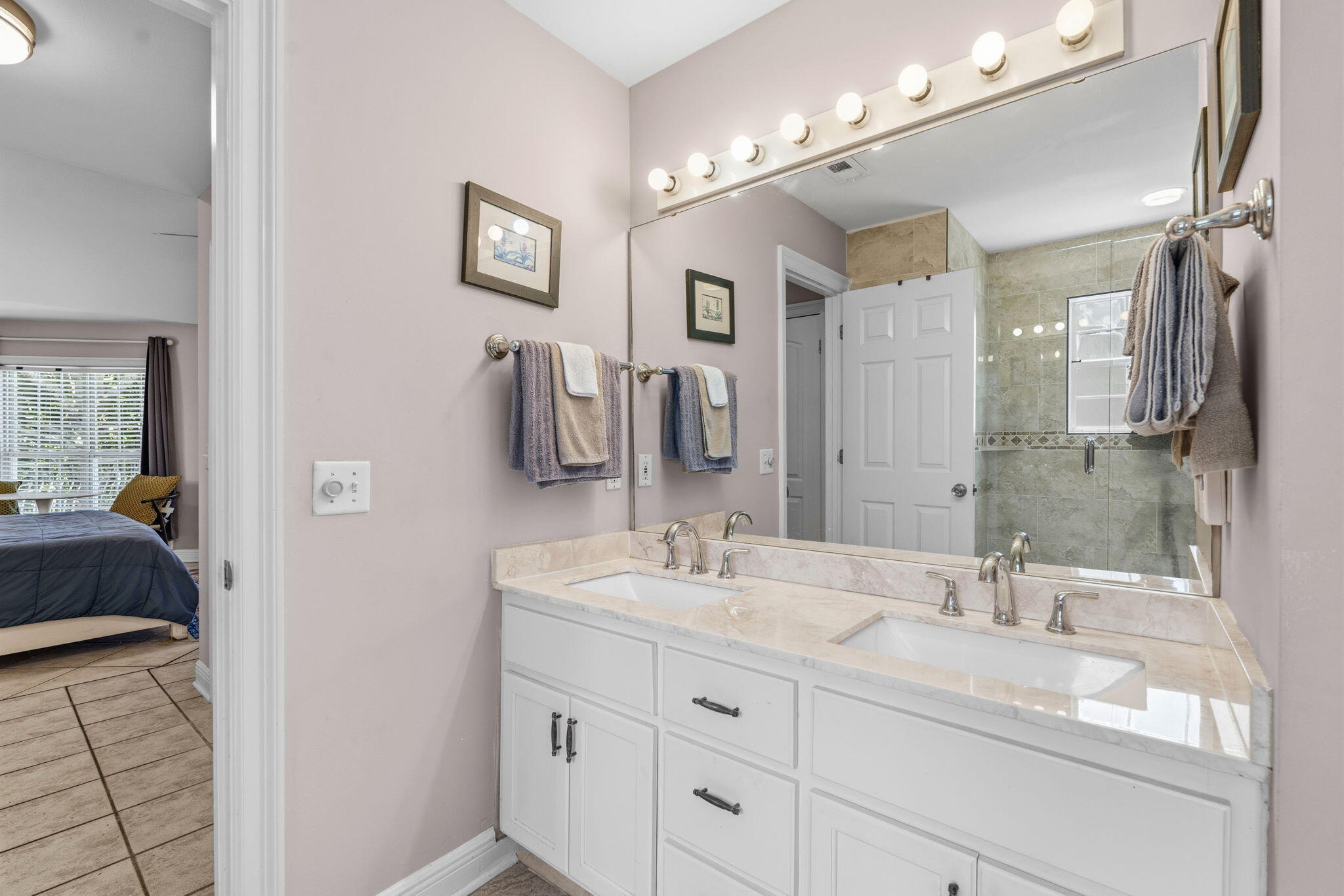 65 Vantage Point Miramar Beach, FL 32550 - Photo 37 of 63 a bathroom with a double vanity sink and a mirror