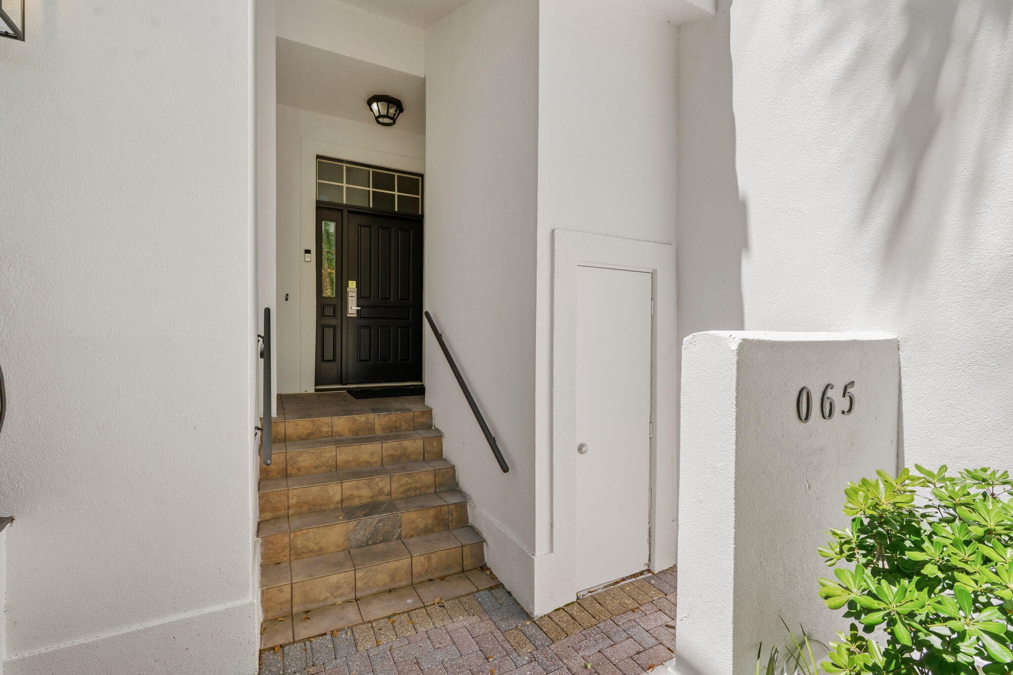 65 Vantage Point Miramar Beach, FL 32550 - Photo 4 of 63 a view of a hallway with wooden floor and entryway