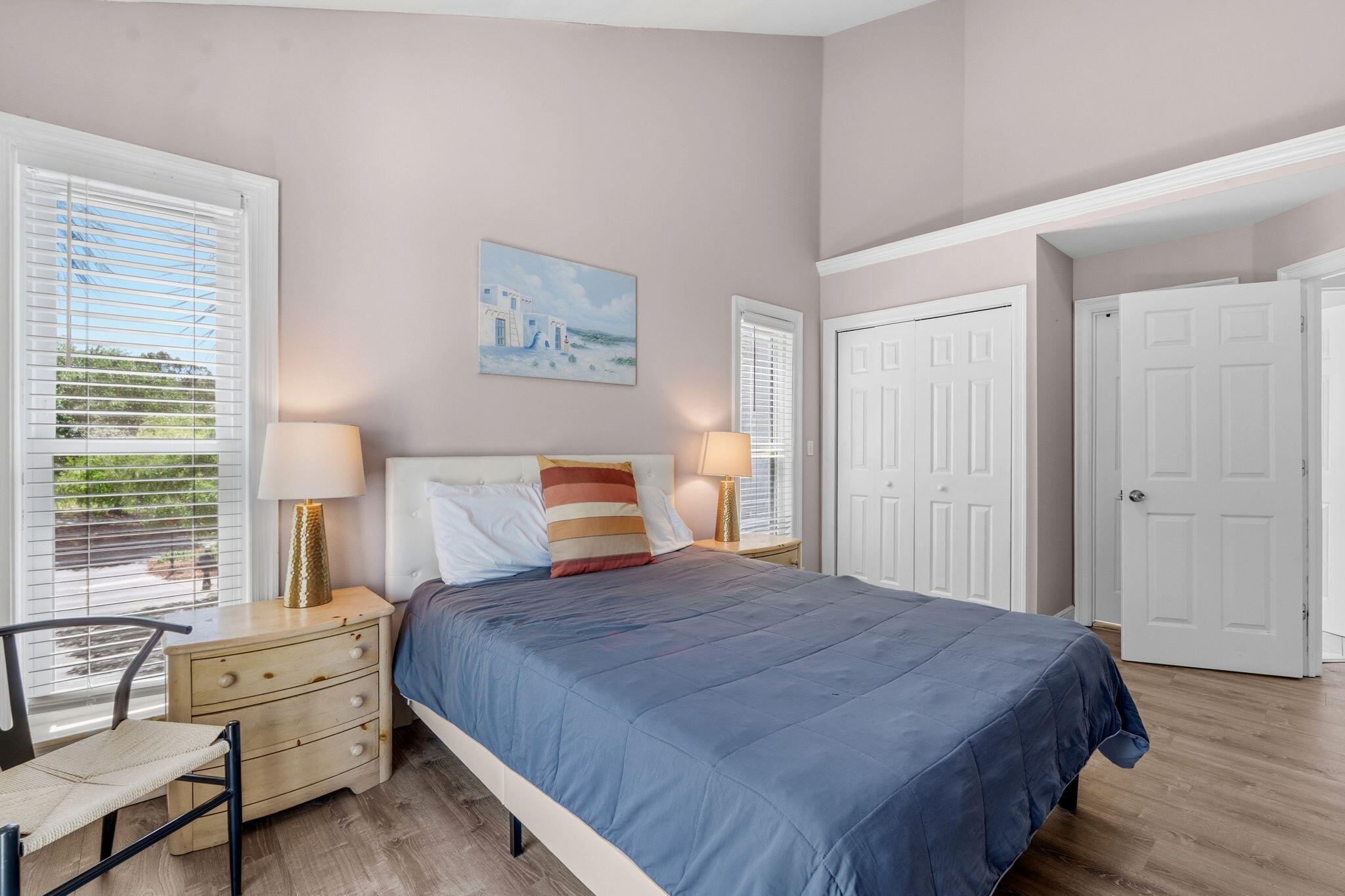 65 Vantage Point Miramar Beach, FL 32550 - Photo 47 of 63 a bedroom with a bed and wooden floor