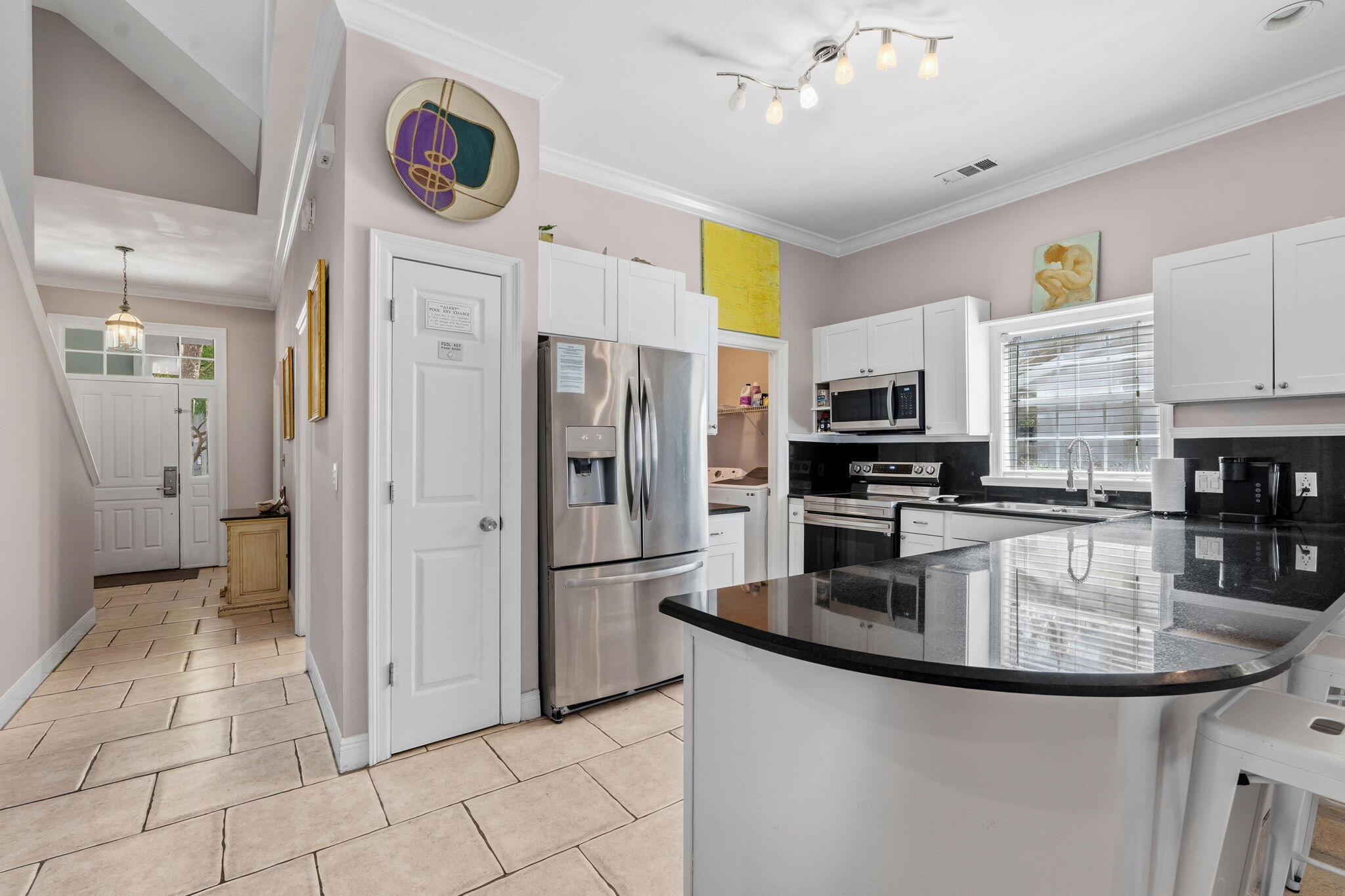 65 Vantage Point Miramar Beach, FL 32550 - Photo 8 of 63 a kitchen with stainless steel appliances granite countertop a stove refrigerator and cabinets