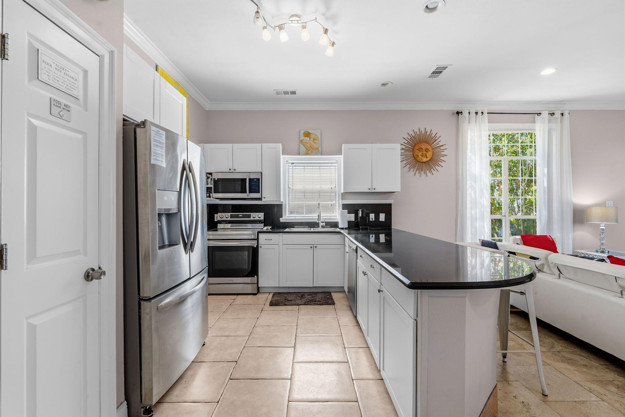 65 Vantage Point Miramar Beach, FL 32550 - Photo 9 of 63 a kitchen with stainless steel appliances granite countertop a refrigerator sink and stove
