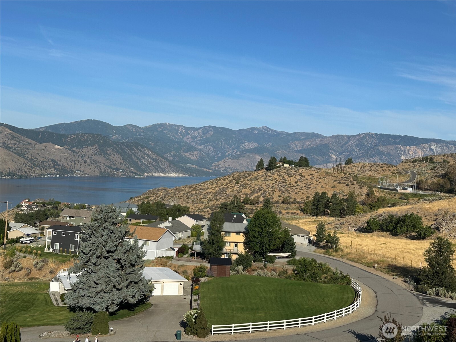 211 Pinnacle Place Chelan, WA 98816 - Photo 6 of 28 a view of a city with mountains