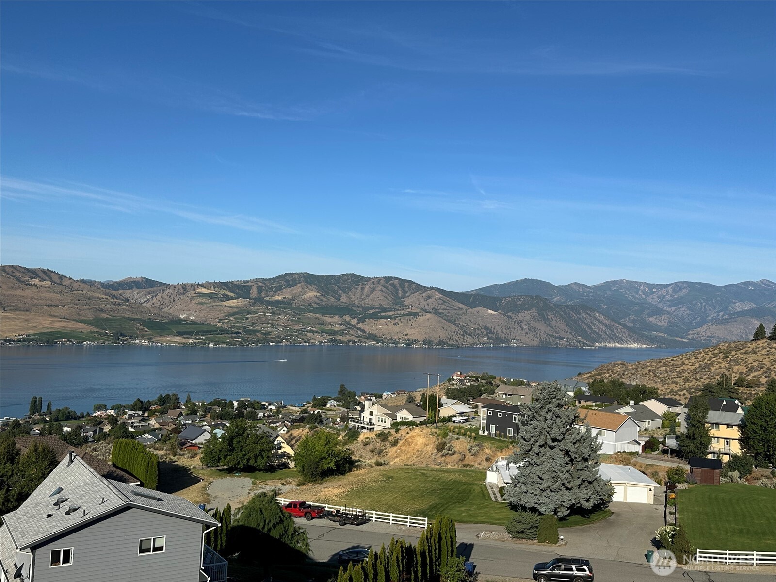 211 Pinnacle Place Chelan, WA 98816 - Photo 7 of 28 an aerial view of a town with couple of houses