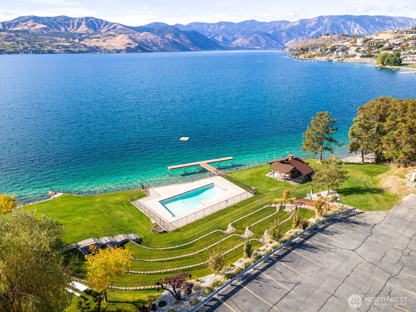 211 Pinnacle Place Chelan, WA 98816 - Photo 9 of 28 a view of an ocean from a balcony