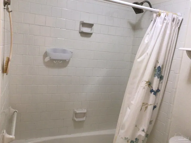 a bathroom with a sink a mirror and vanity