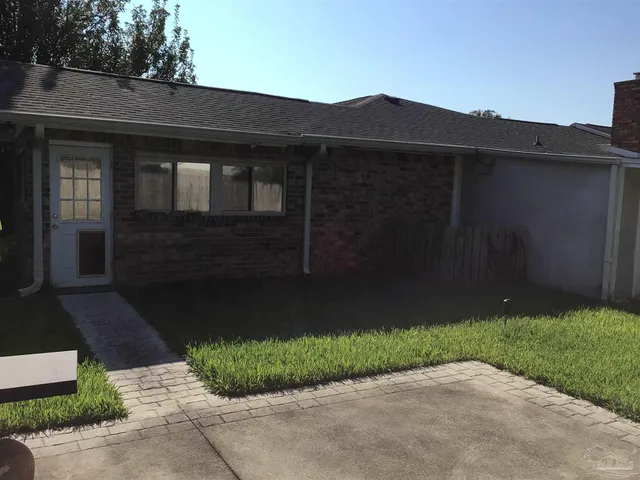 a view of a backyard with a garden