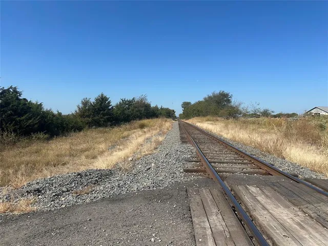 an aerial view of beach with residential space and ocean view