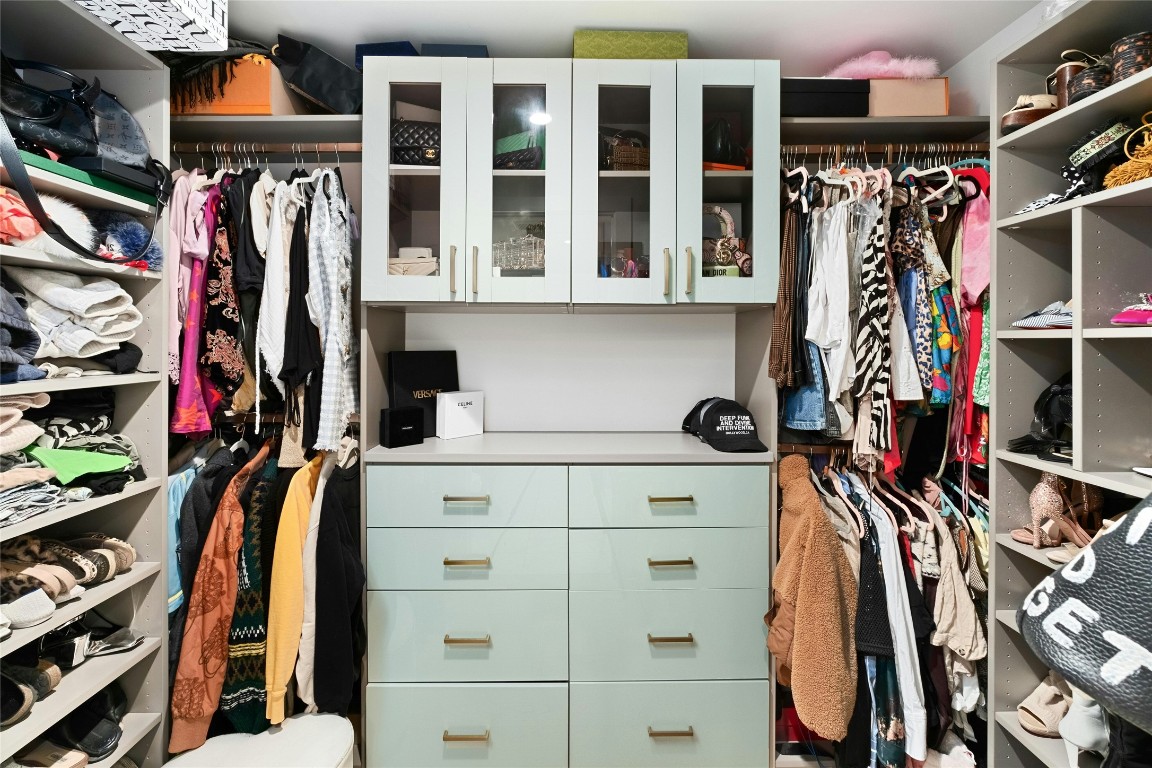 70 Rainey Street, Unit 2702 Austin, TX 78701 - Photo 19 of 40 a view of walk in closet with clothes and shoes