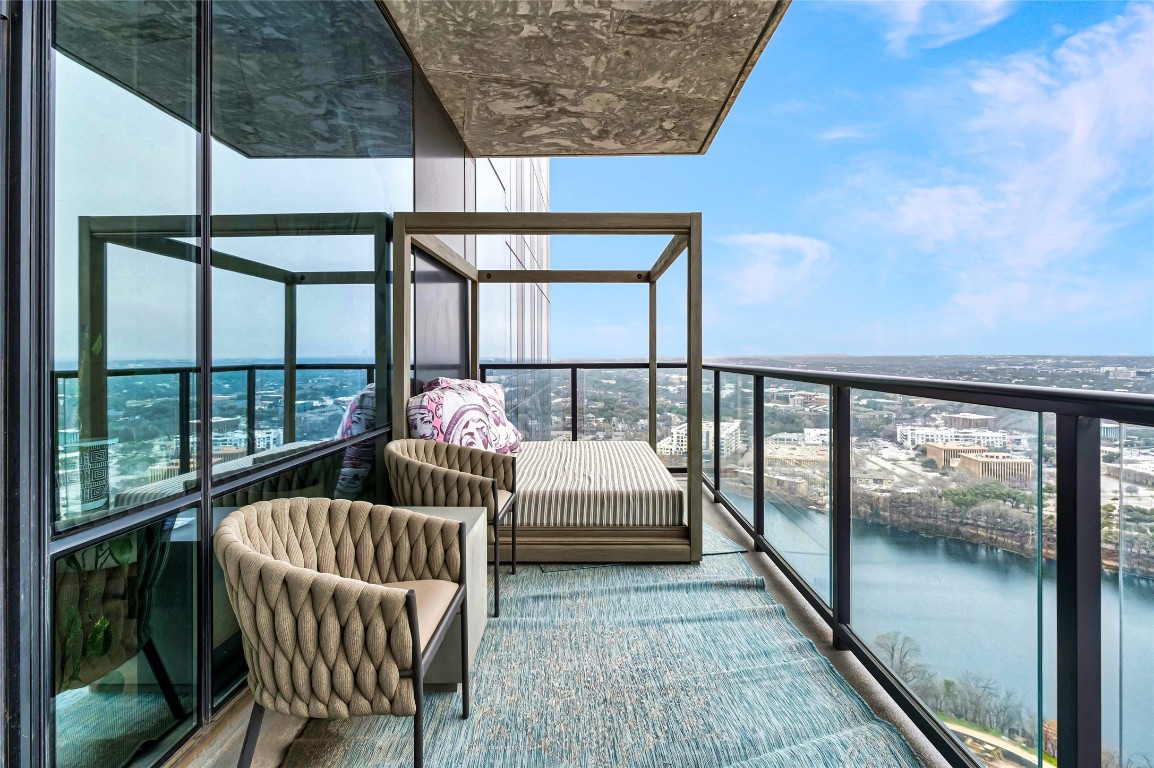 70 Rainey Street, Unit 2702 Austin, TX 78701 - Photo 24 of 40 a bedroom with furniture and a window