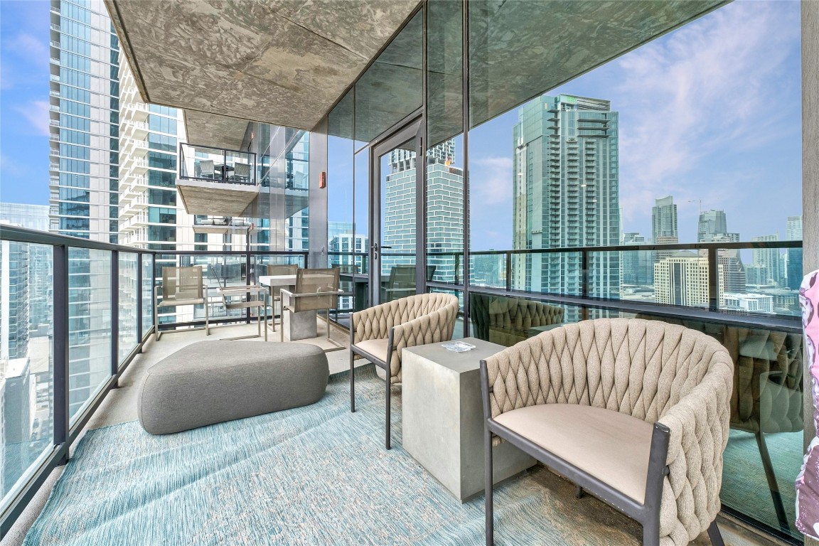 70 Rainey Street, Unit 2702 Austin, TX 78701 - Photo 26 of 40 a view of balcony with couch and chairs