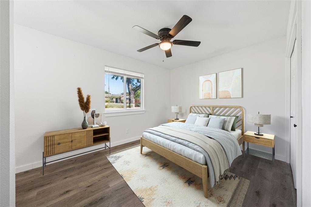 2126 Travis Drive Carrollton, TX 75006 - Photo 13 of 23 a bedroom with a bed and dresser