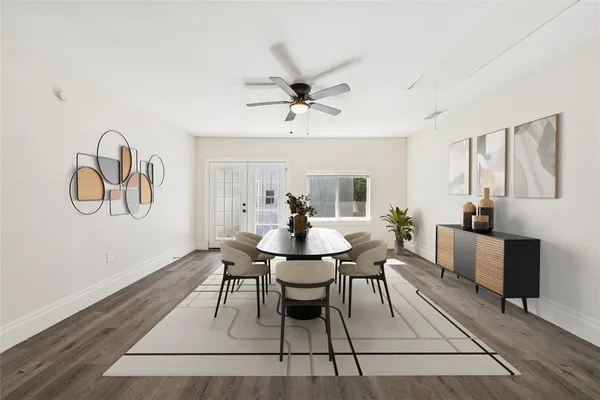 a view of a dining room with furniture window and wooden floor