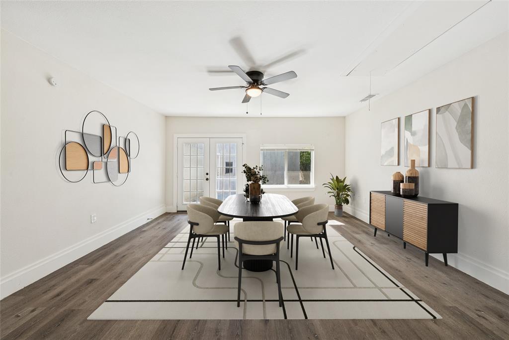2126 Travis Drive Carrollton, TX 75006 - Photo 8 of 23 a view of a dining room with furniture window and wooden floor