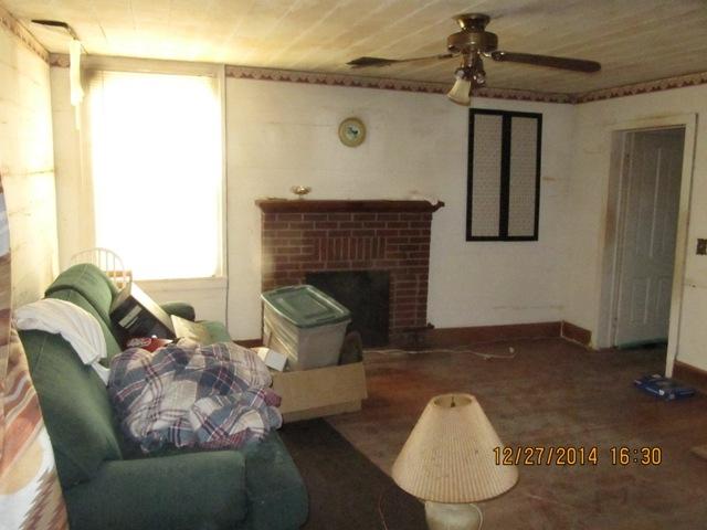 2011 Daniels Run Road Northeast Check, VA 24072 - Photo 4 of 12 a living room with furniture and a fireplace