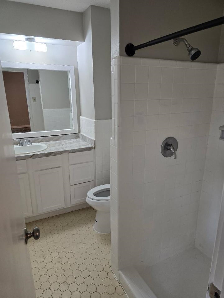 6272 Macon Road Memphis, TN 38134 - Photo 9 of 13 a bathroom with a toilet and a mirror
