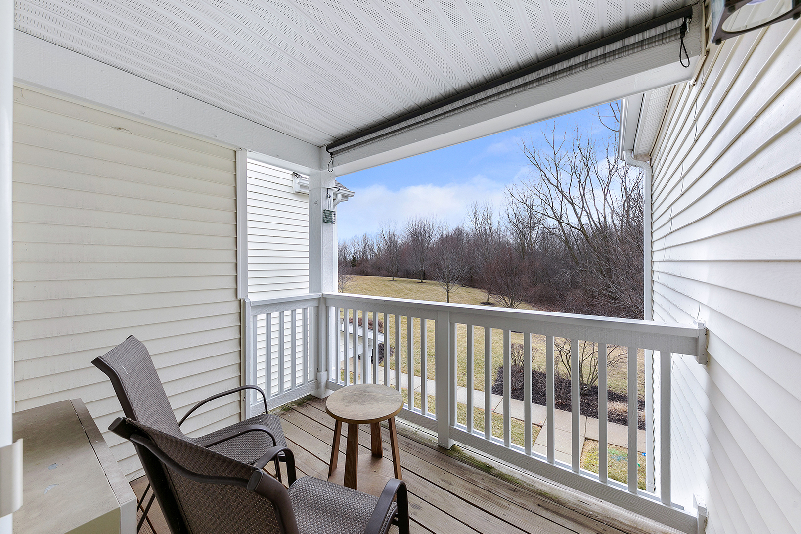 1488 McClure Road, Unit 1488 Aurora, IL 60505 - Photo 16 of 19 a view of a two chairs in the balcony