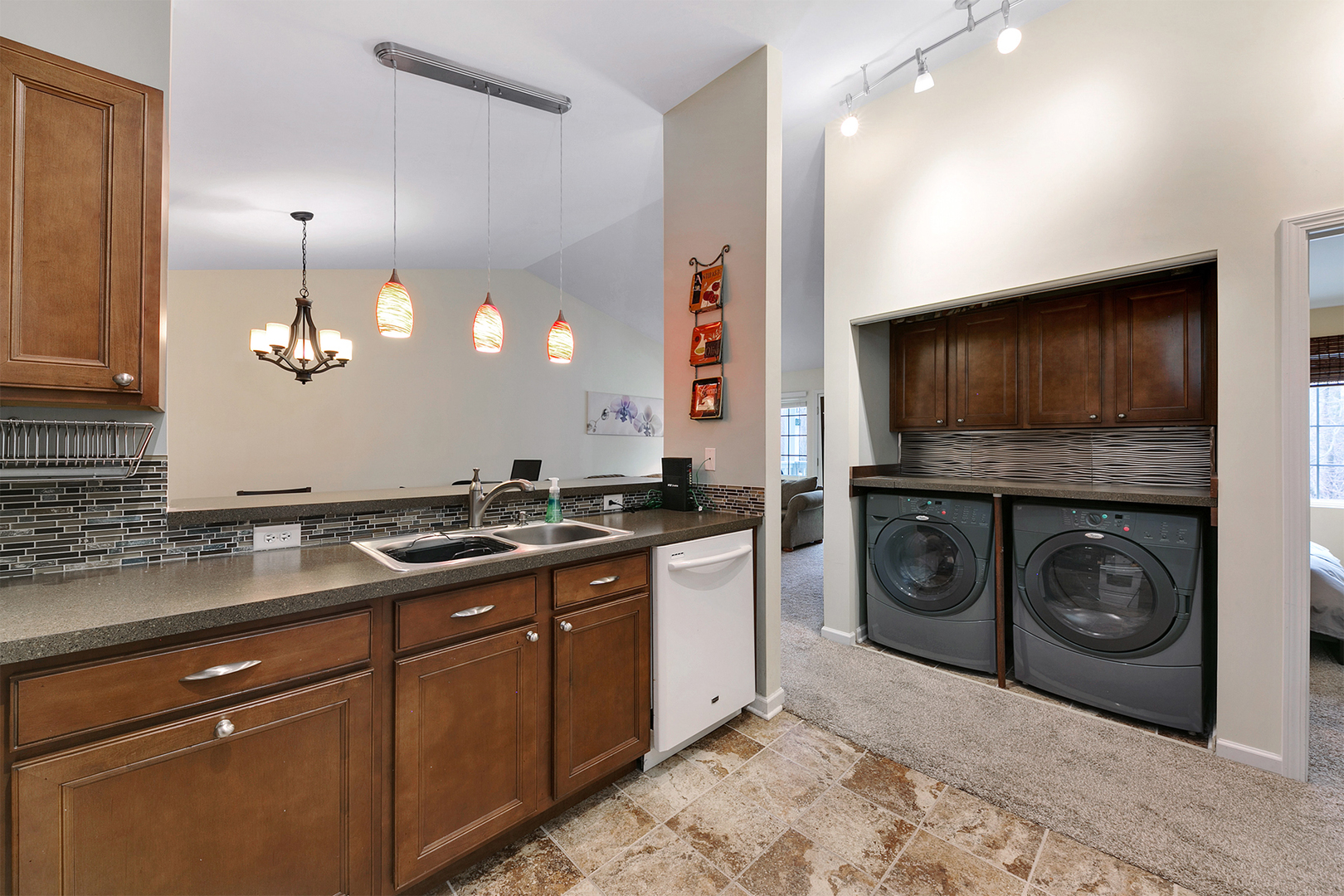 1488 McClure Road, Unit 1488 Aurora, IL 60505 - Photo 6 of 19 a kitchen with a sink a stove and cabinets