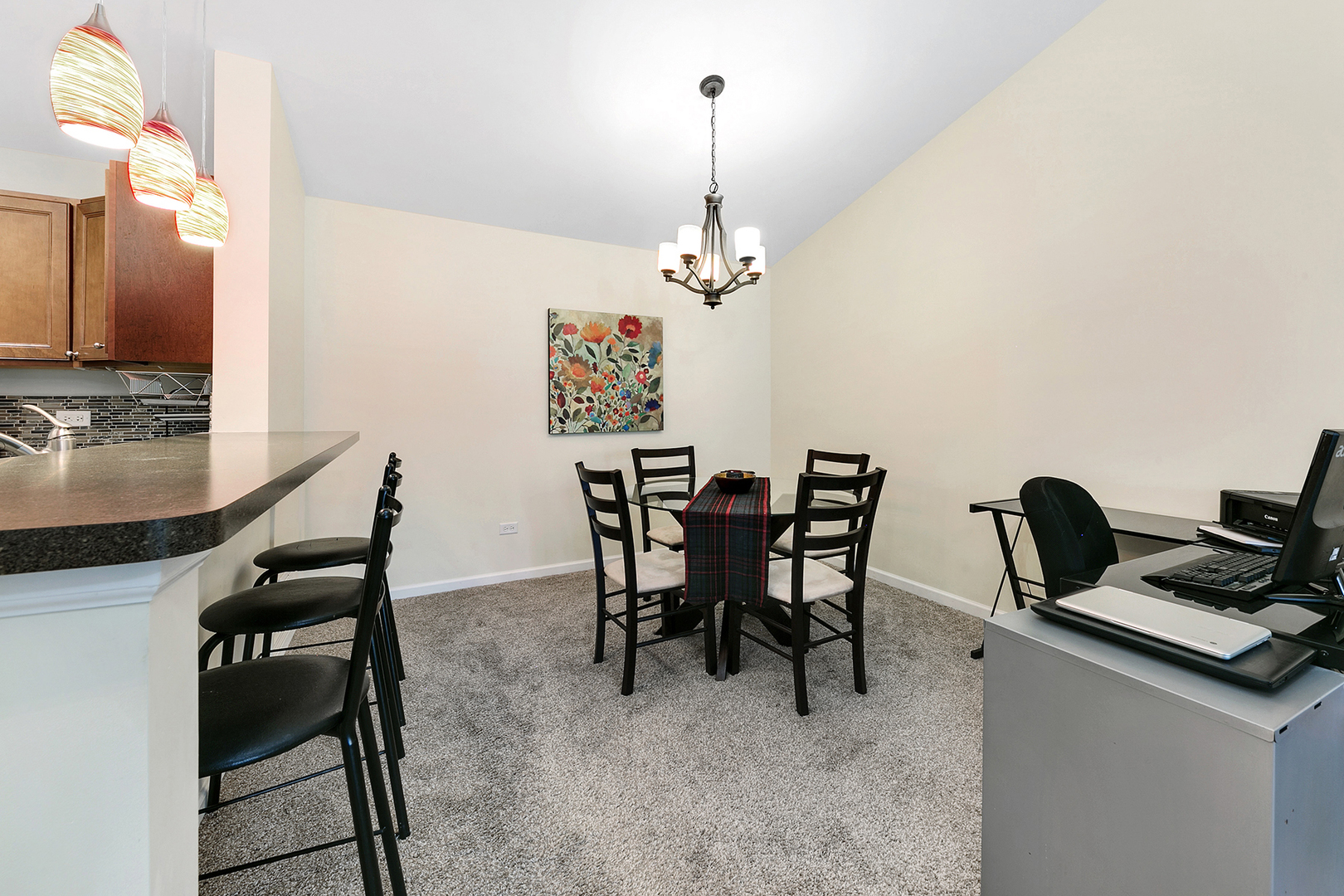1488 McClure Road, Unit 1488 Aurora, IL 60505 - Photo 7 of 19 a view of a dining room with furniture and a chandelier