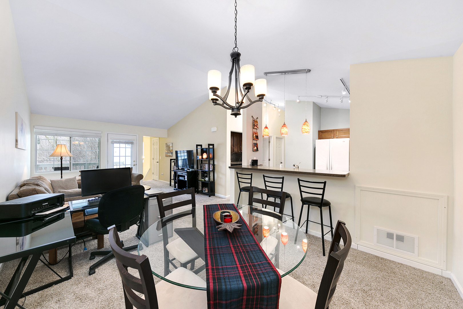 1488 McClure Road, Unit 1488 Aurora, IL 60505 - Photo 8 of 19 a view of a dining room with furniture window and wooden floor