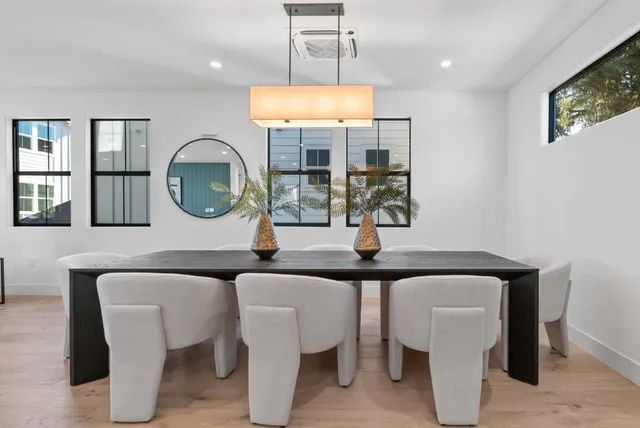 a kitchen with sink a stove and cabinets