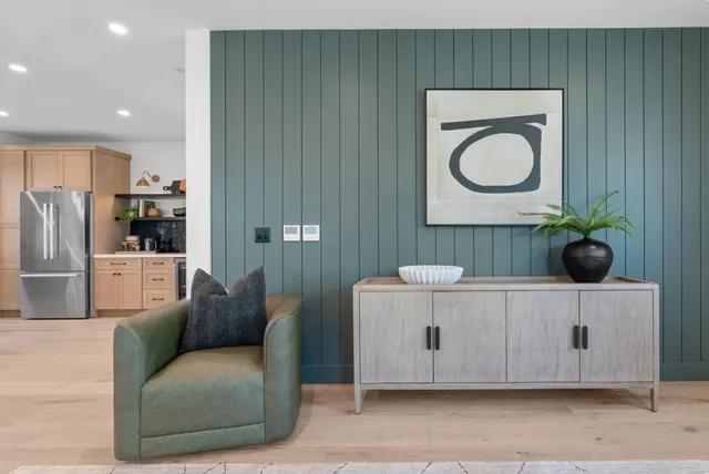 a bed room with bed and window