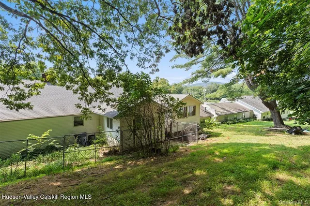 a view of a garden with a tree