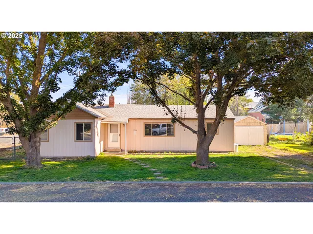 a picture of a house with a yard