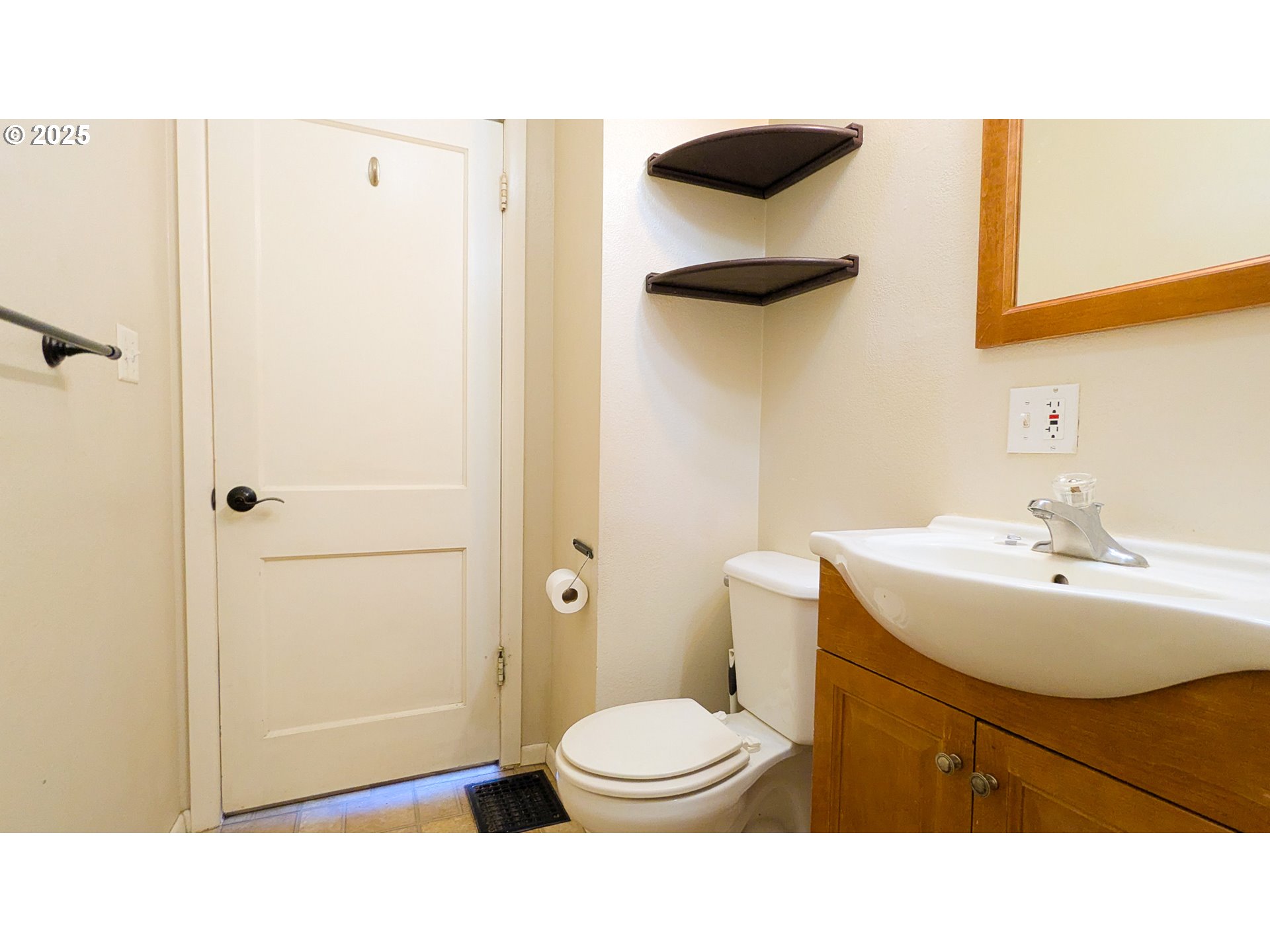 216 Solar Street Helix, OR 97835 - Photo 19 of 36 a bathroom with a sink a toilet and a mirror