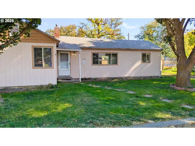 a black and white photo of a house
