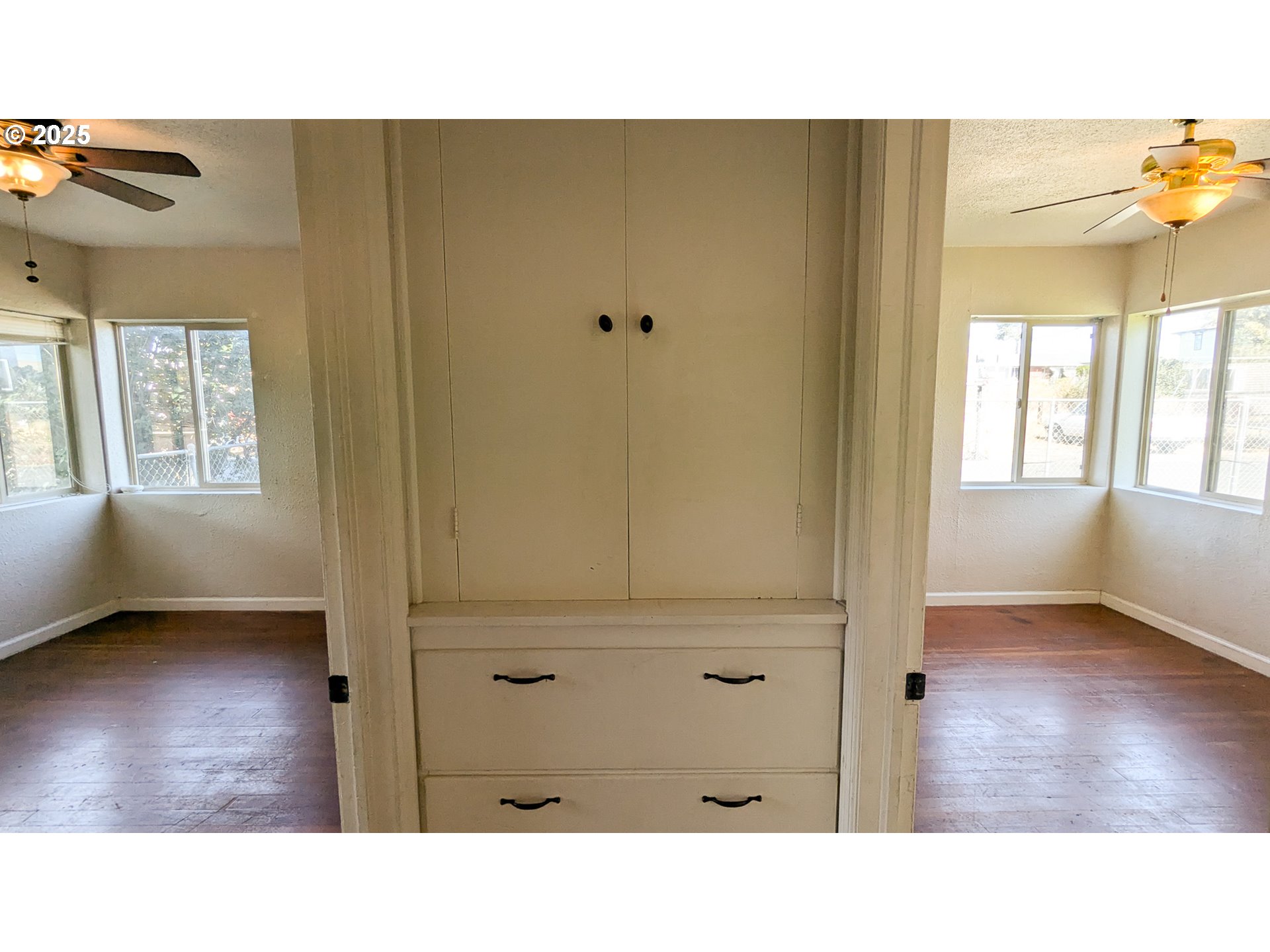 216 Solar Street Helix, OR 97835 - Photo 22 of 36 a open hall with a hardwood floor and a cabinet