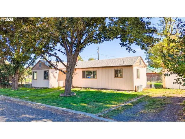 a black and white photo of a house