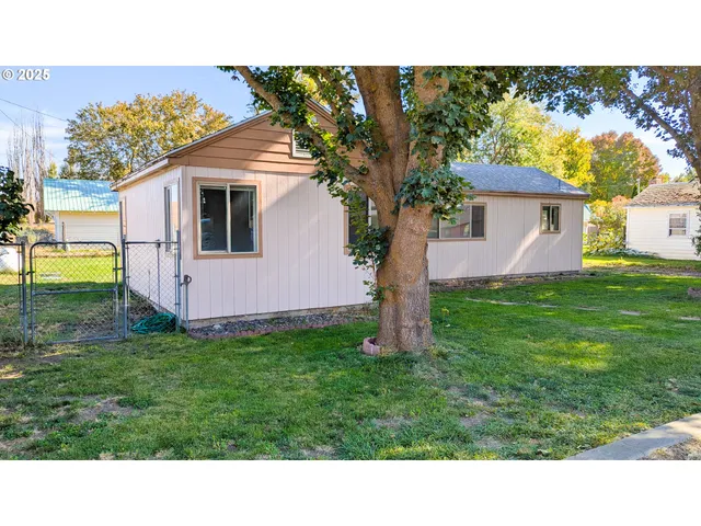 a black and white photo of a house