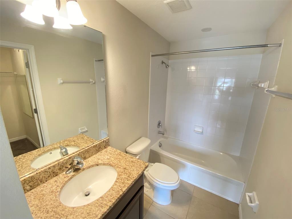 600 Northern Way, Unit 1001 Winter Springs, FL 32708 - Photo 7 of 37 a bathroom with a sink toilet and shower