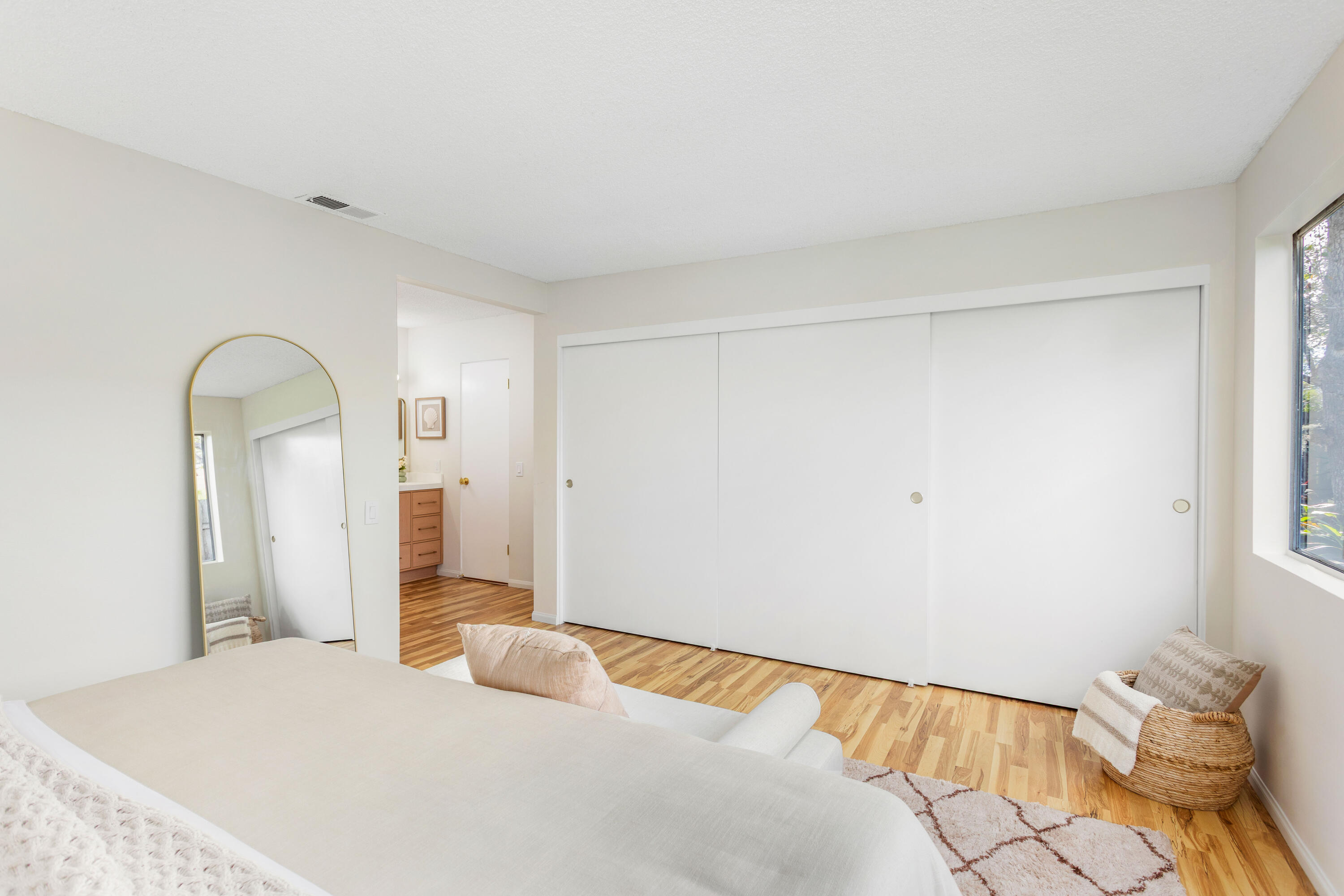 1425 Azalea Drive Carpinteria, CA 93013 - Photo 14 of 28 a bedroom with a bed and a mirror