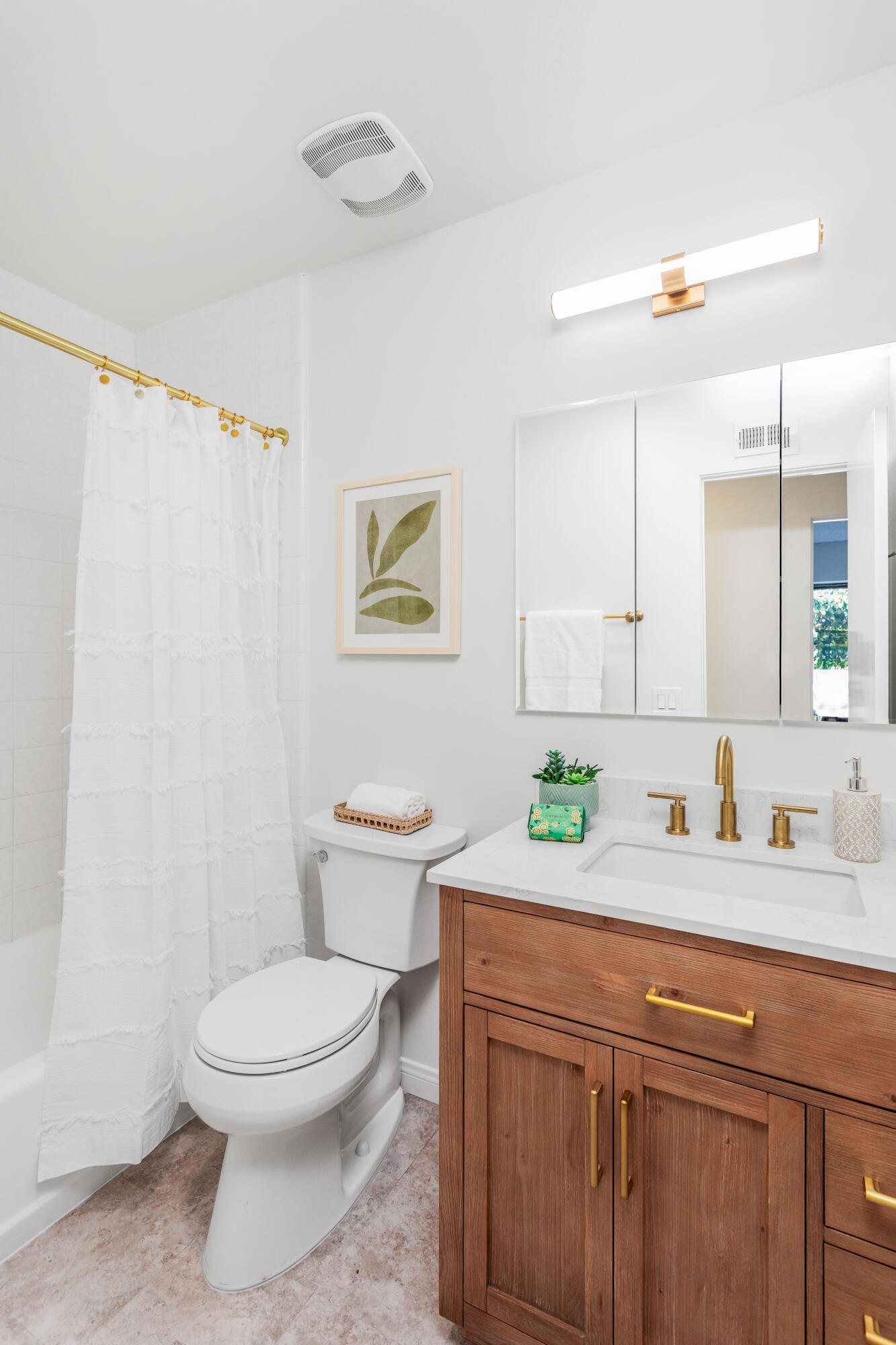 1425 Azalea Drive Carpinteria, CA 93013 - Photo 19 of 28 a bathroom with a toilet sink and mirror