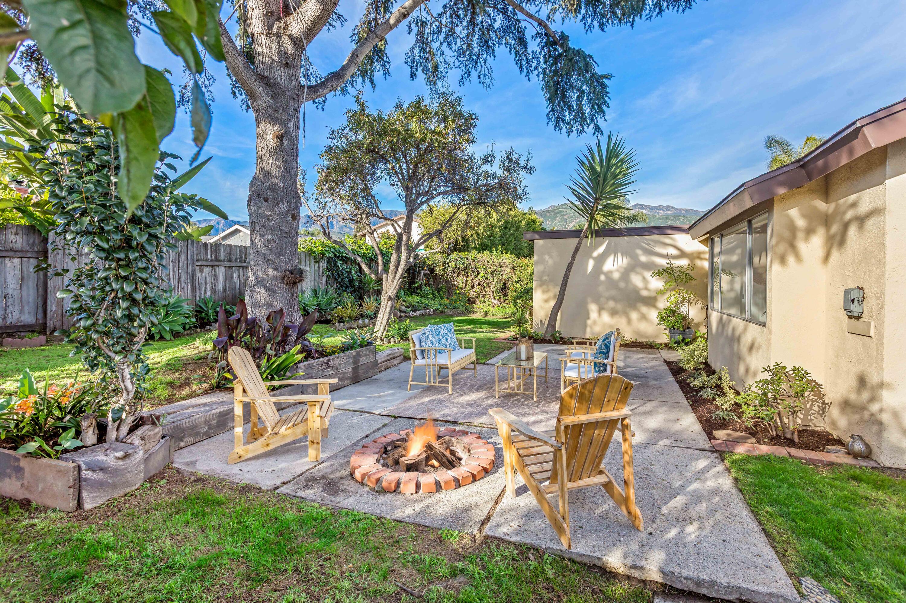 1425 Azalea Drive Carpinteria, CA 93013 - Photo 22 of 28 a view of a backyard with plants and outdoor seating
