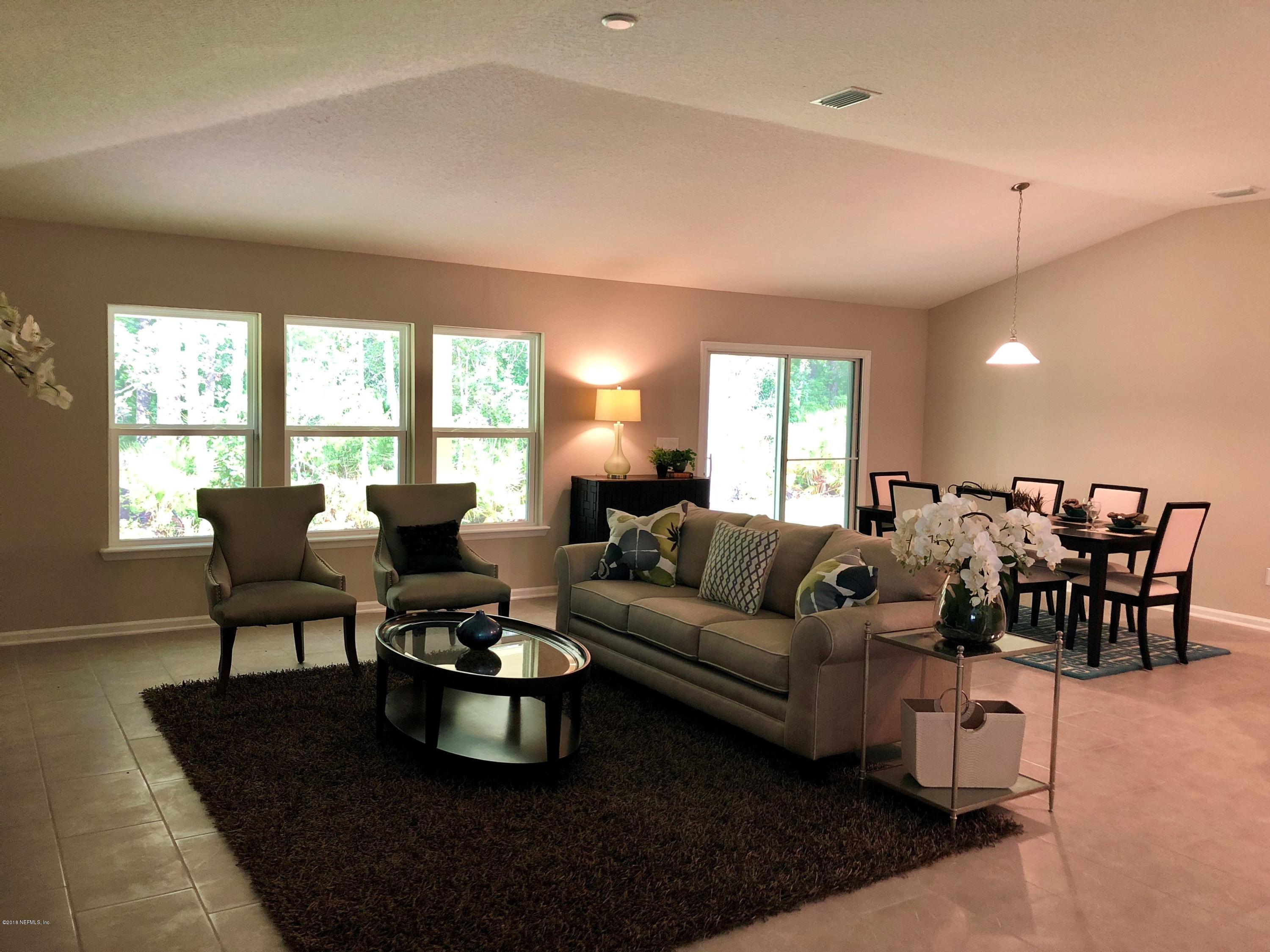 211 Rittburn Lane St. Johns, FL 32259 - Photo 3 of 14 Family Room with Preserve View #2