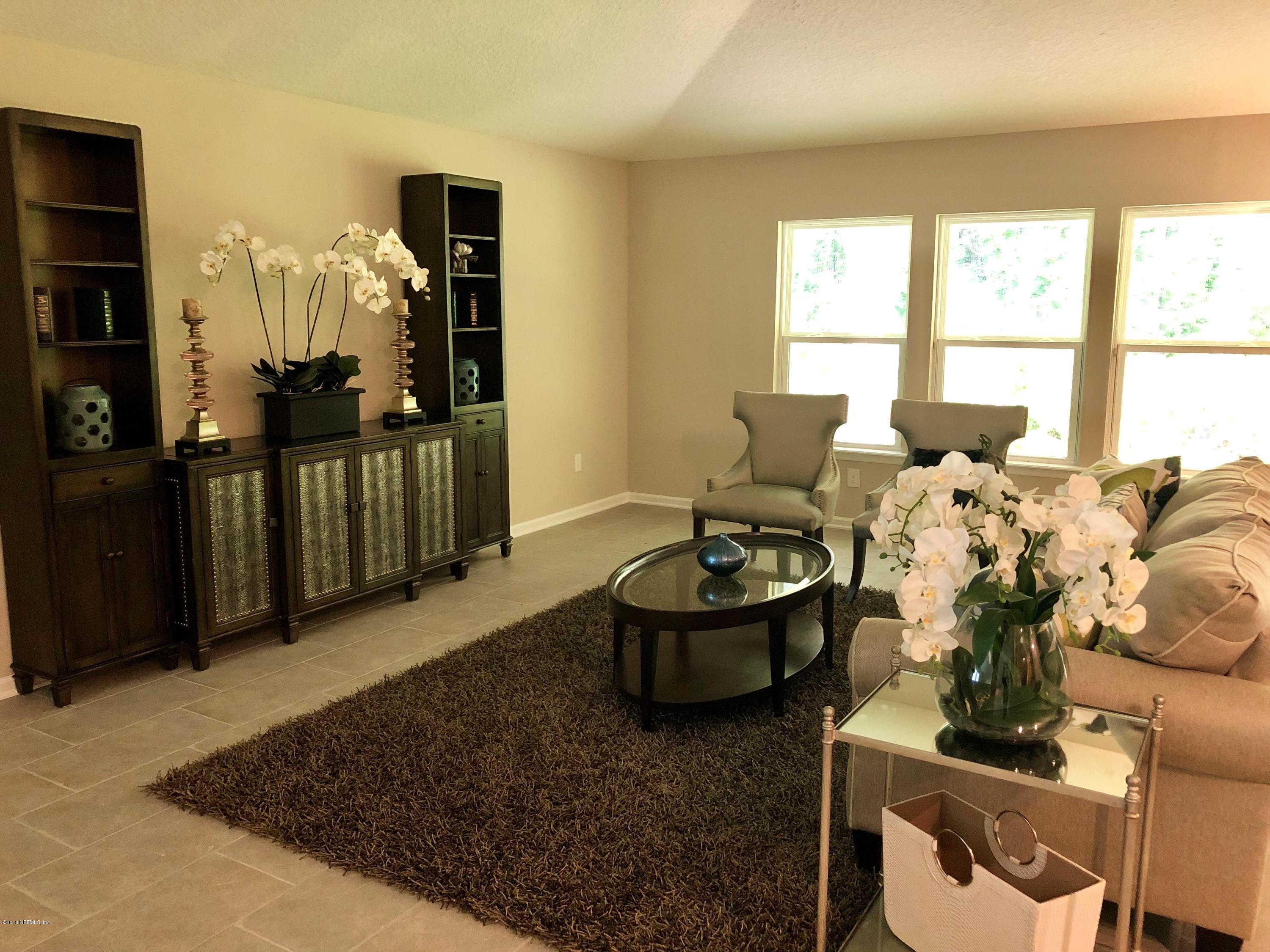 211 Rittburn Lane St. Johns, FL 32259 - Photo 4 of 14 Family Room with Preserve View
