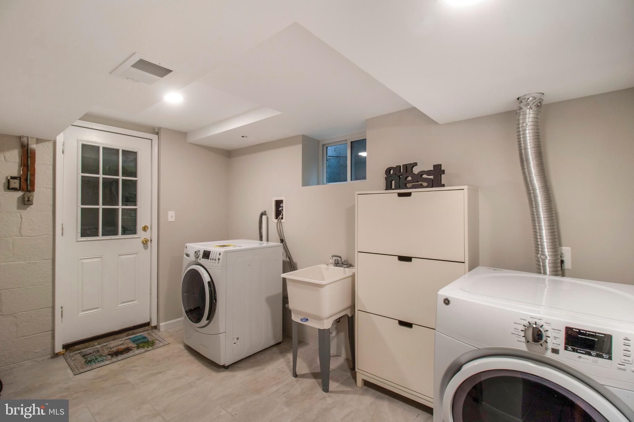 9013 Eton Road Silver Spring, MD 20901 - Photo 40 of 42 Spacious laundry/mud room combo w/ backyard access