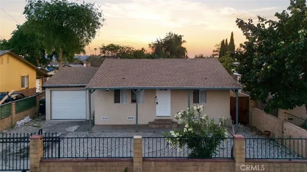 a house view with a garden space
