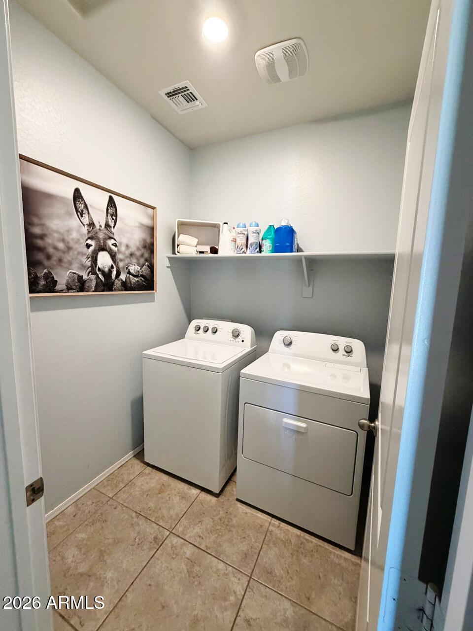 7851 West Riverside Avenue Phoenix, AZ 85043 - Photo 26 of 40 a utility room with dryer and washer