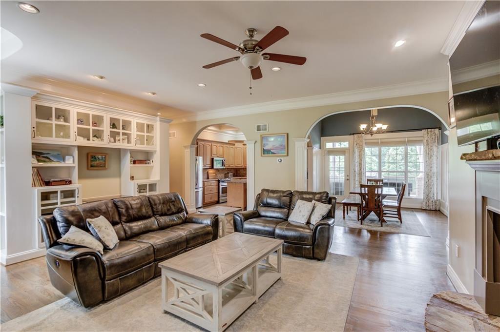 5667 Britt Whitmire Road Gainesville, GA 30506 - Photo 12 of 67 a living room with furniture and wooden floor