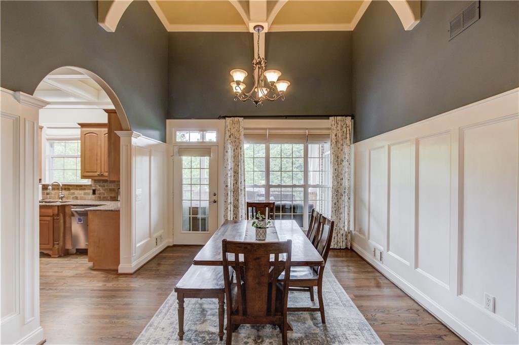 5667 Britt Whitmire Road Gainesville, GA 30506 - Photo 13 of 67 a view of a dining room with furniture window and wooden floor