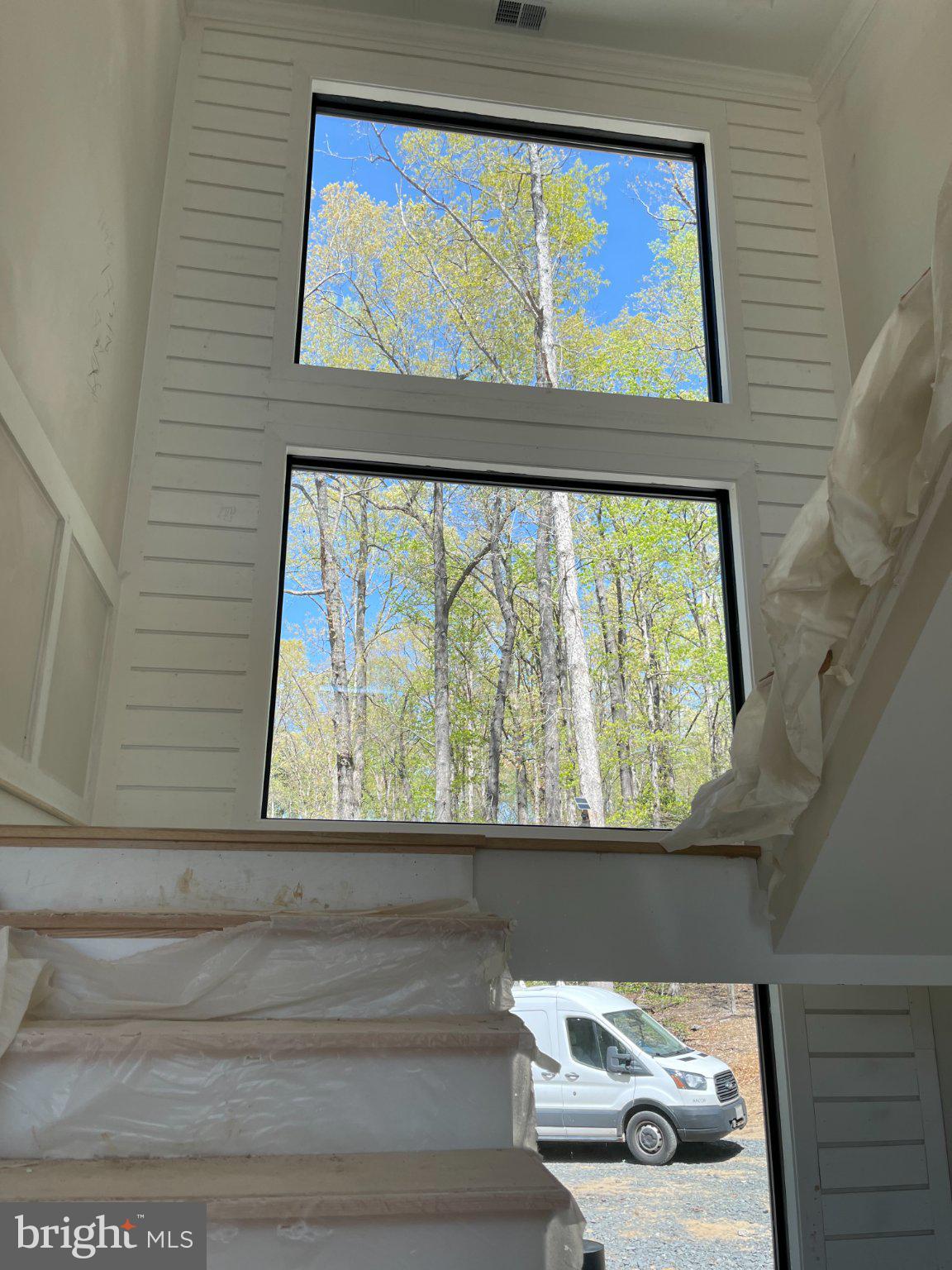 290 Carrs Bridge Road Mineral, VA 23117 - Photo 34 of 38 Sunlit serenity through tall windows.