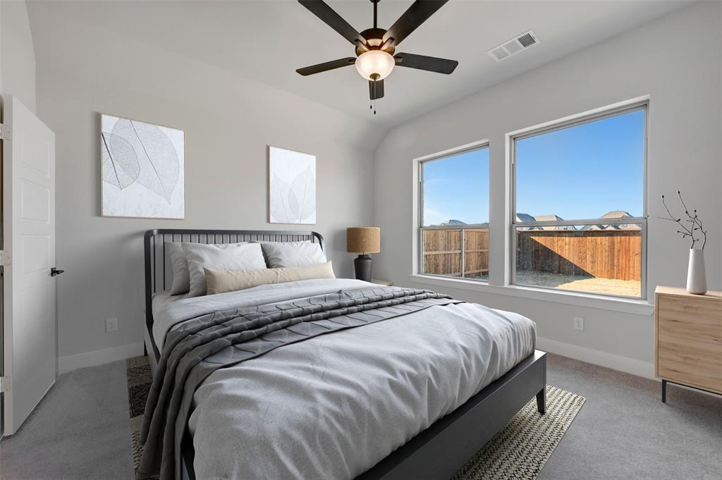 4022 Yellowstone Road Royse City, TX 75189 - Photo 13 of 20 a bedroom with a large bed and a window