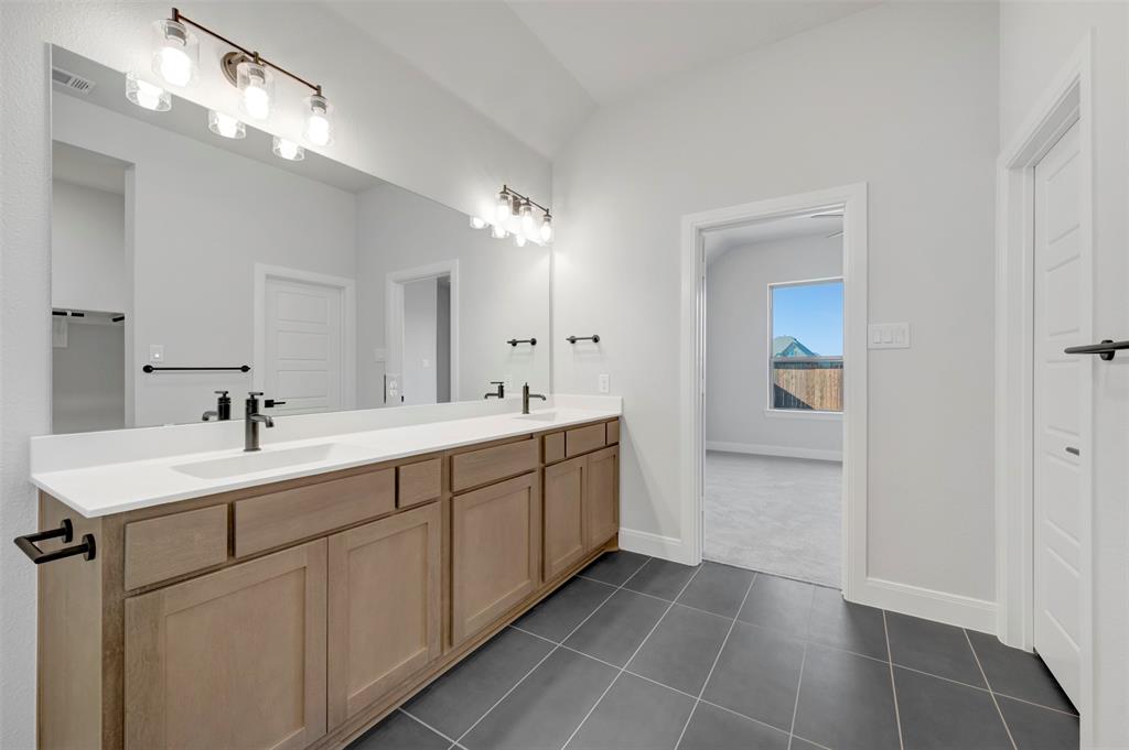 4022 Yellowstone Road Royse City, TX 75189 - Photo 17 of 20 a kitchen with a sink and a mirror